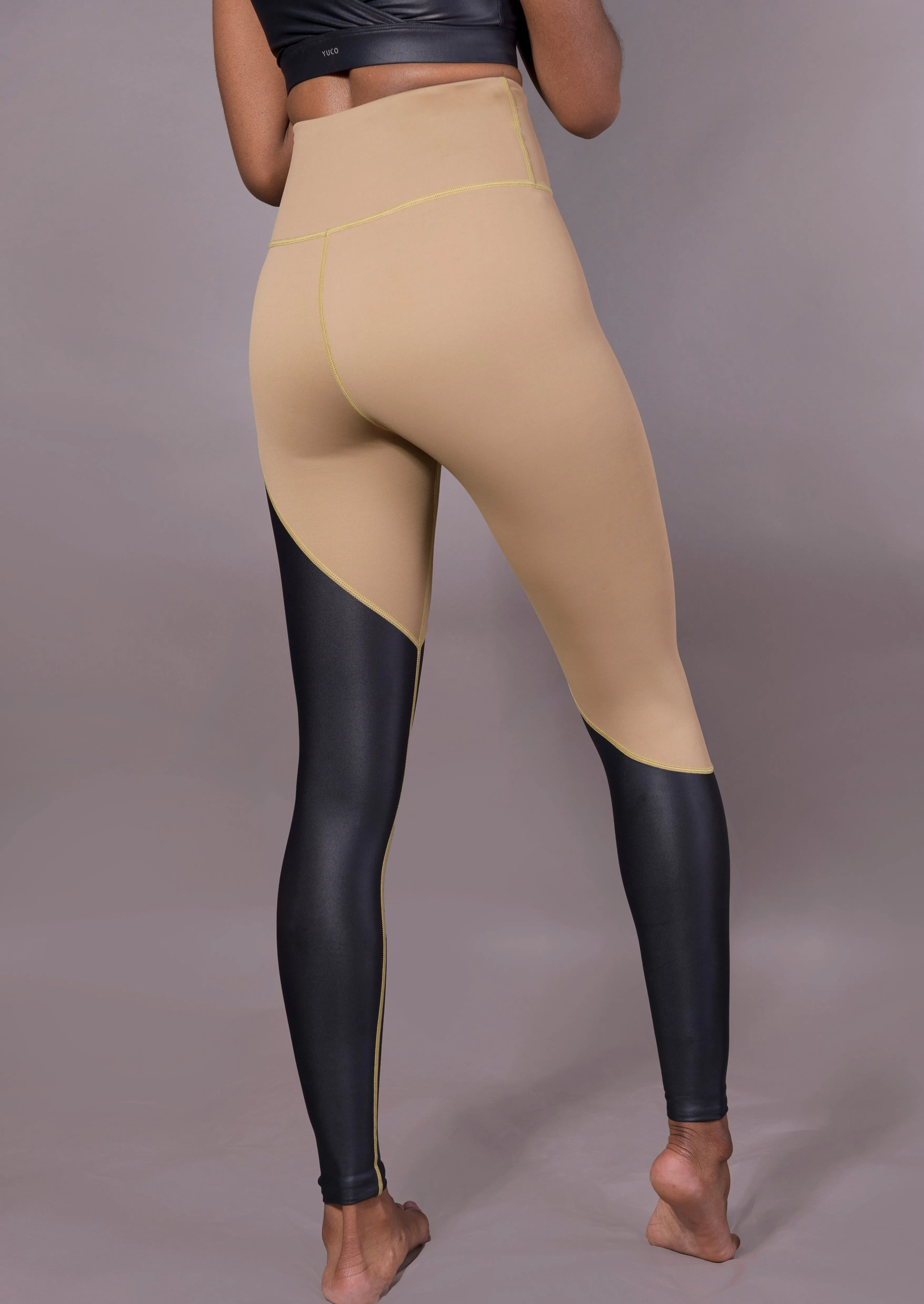 Two-tone liquid leggings in black and light brown